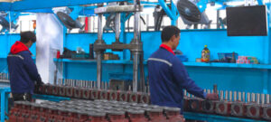 two manufacturing employees prepare parts for quality check Worldwide Sourcing & Solutions United States, China